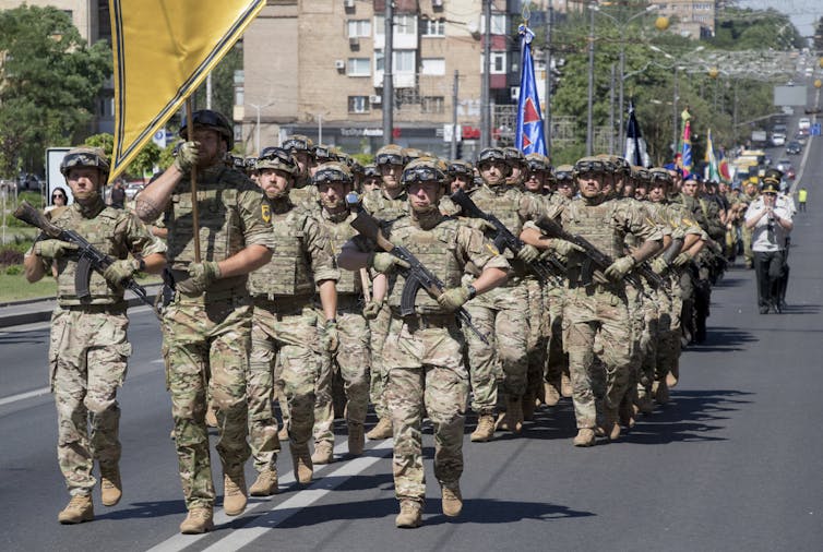 Members of the Azov Battalion match in Mariupol, southern Ukraine, 2019.