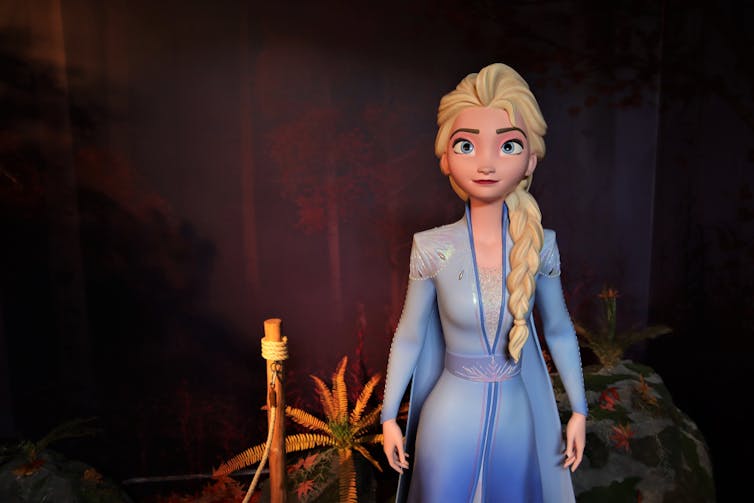 Elsa in front of candle