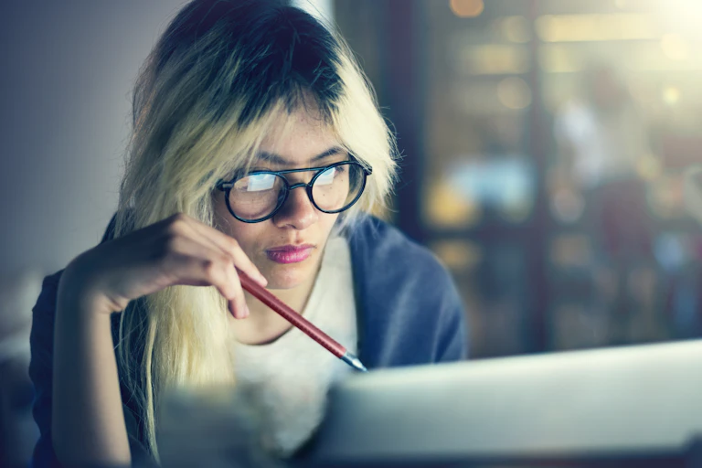 Young woman working at laptop