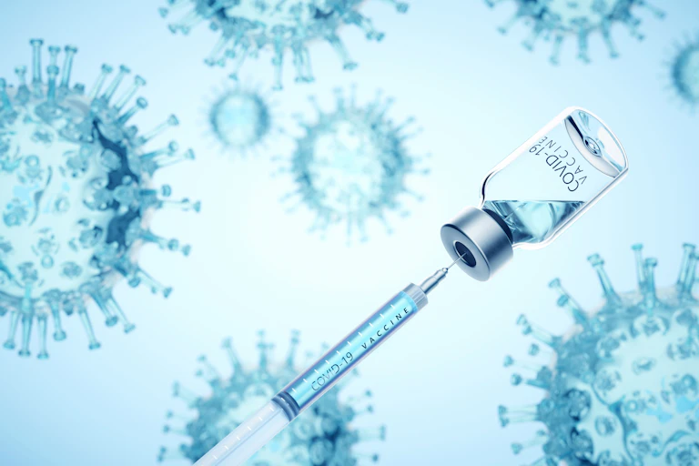 Digitally generated image of syringe filling of COVID-19 vaccine from bottle against viruses on blue background.