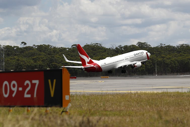 Plane taking off from runway