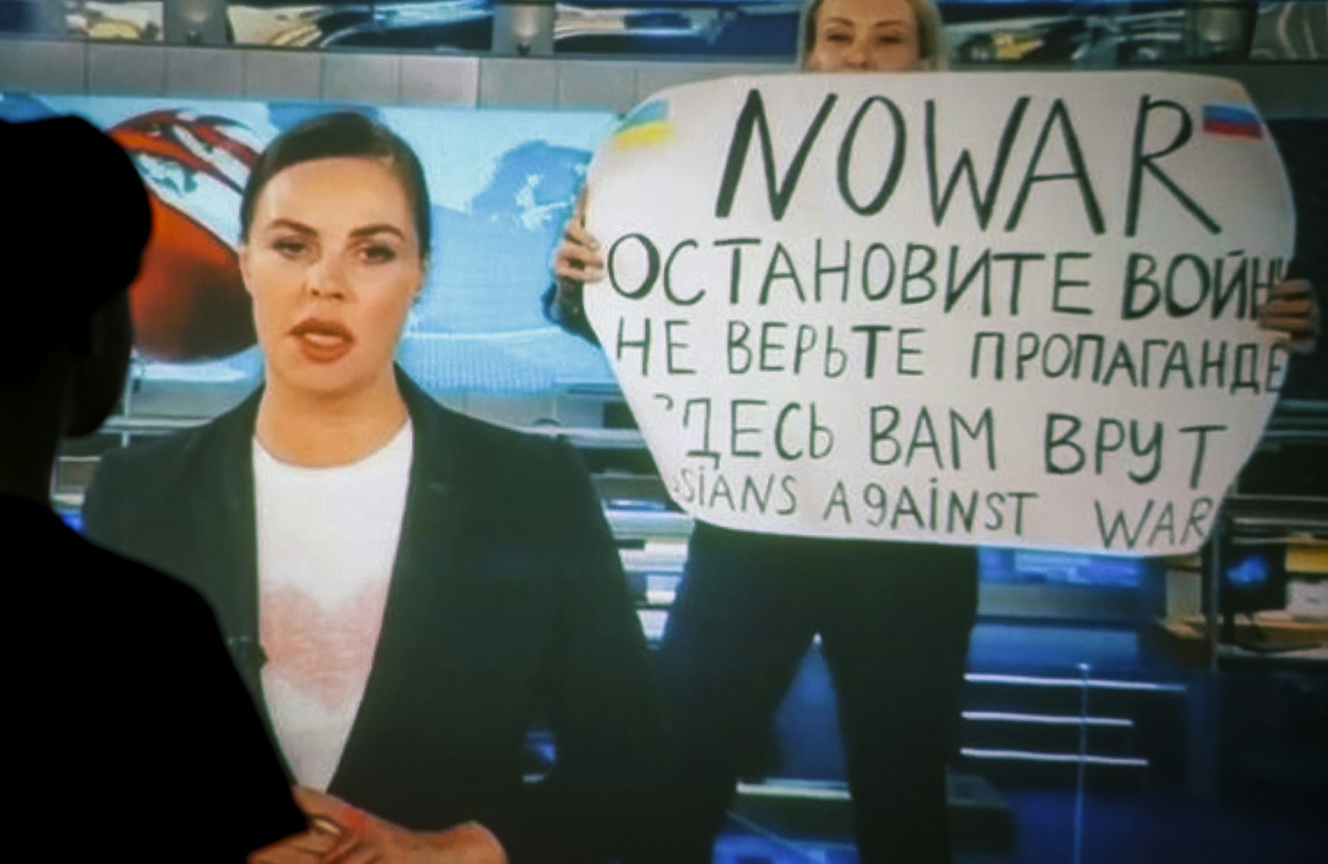 Russian TV producer  Marina Ovsyannikova, interrupts a news broadcast warning viewers that the state-run TV network is lying to them.