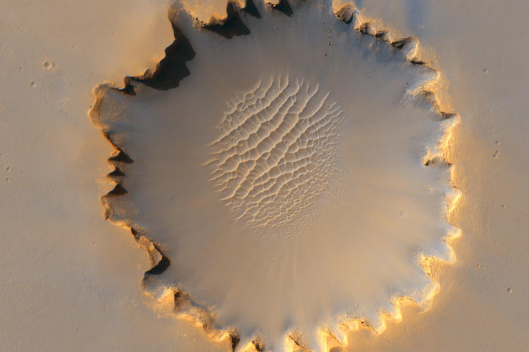 Sand blow in a crater on Mars