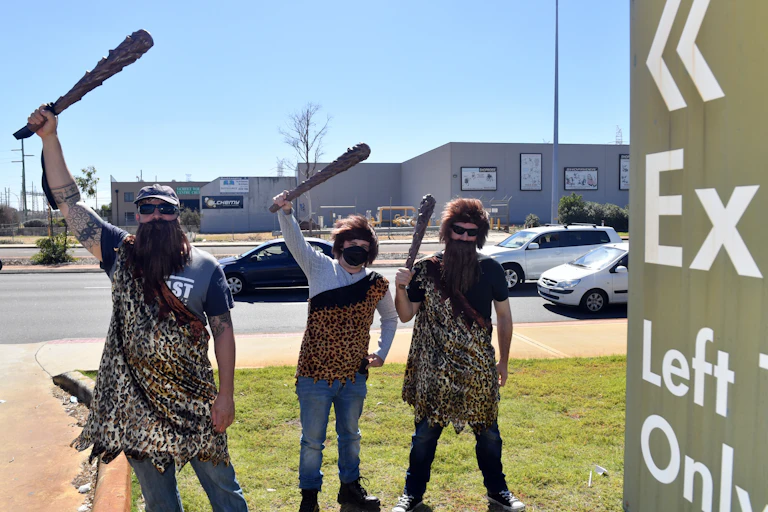 Caveman protestors at Scott Morrison's press conference