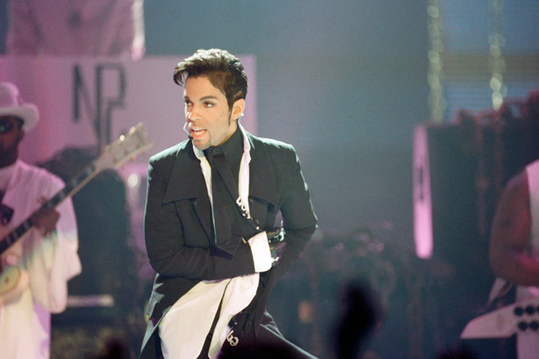 An artist sings on stage.