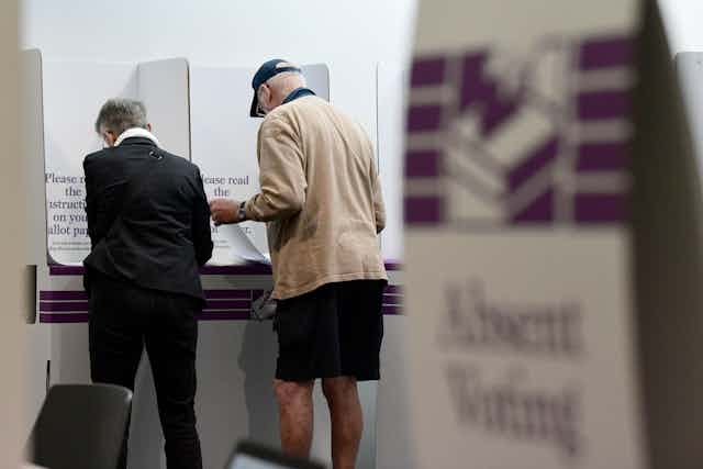 older couple voting