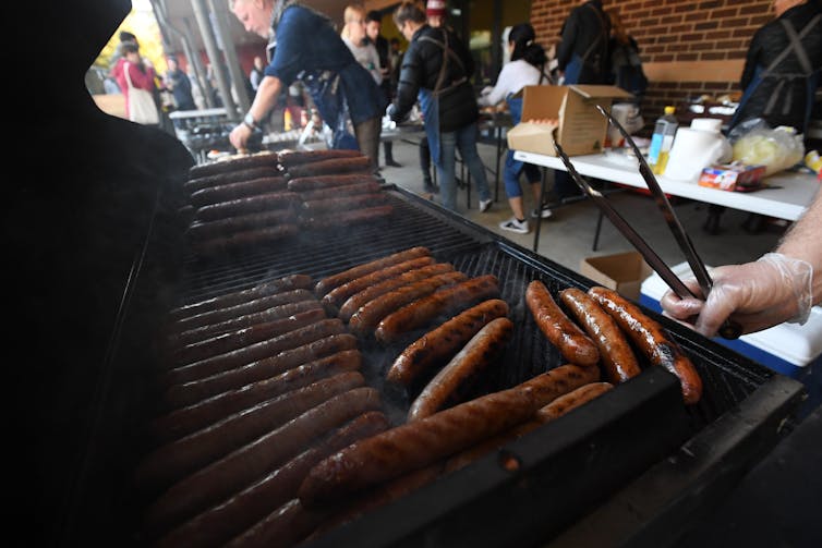 bbq sausages cooking