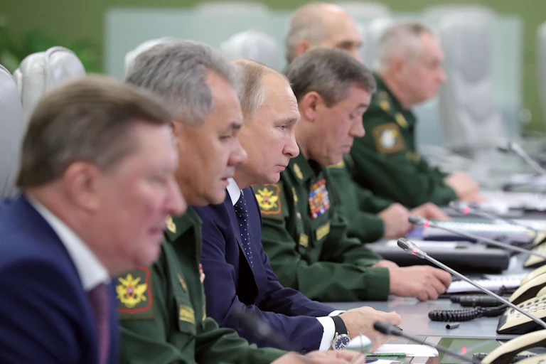 Vladimir Putin with senior military officers.