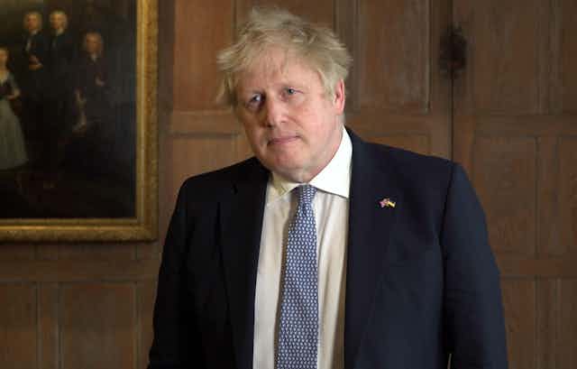 Boris Johnson giving a statement from Chequers.