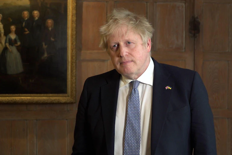 Boris Johnson giving a statement from Chequers.