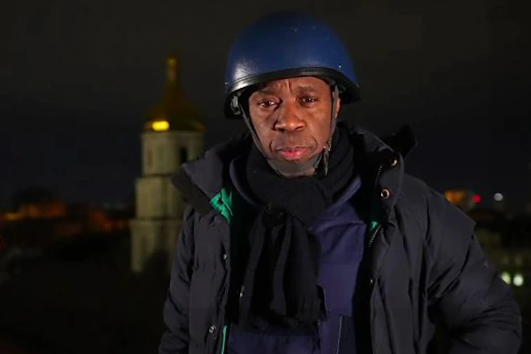 BBC reporter Clive Myrie in protective clothing while reporting from Ukraine, March 2022.