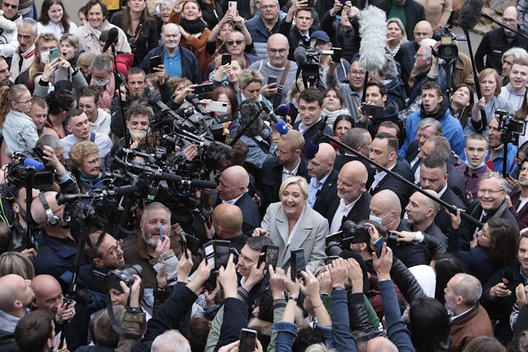 Presidential candidate Marine Le Pen with supporters.