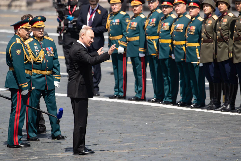 Russian President Vladimir Putin addresses army officers at a parade in Red Square