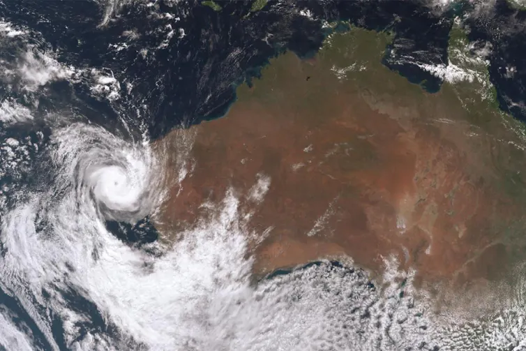 A satellite image showing the swirling clouds of a cyclone off the coast of Western Australia.