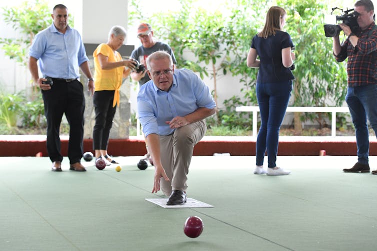 Prime Minister Scott Morrison plays lawn bowls.