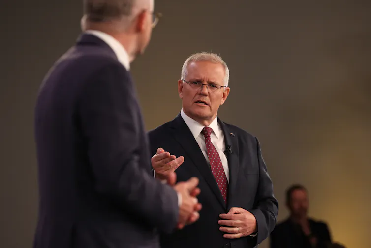 Prime Minister Scott Morrison debates Opposition Leader Anthony Albanese during the first leaders' debate of the 2022 federal election on April 20 2022.
