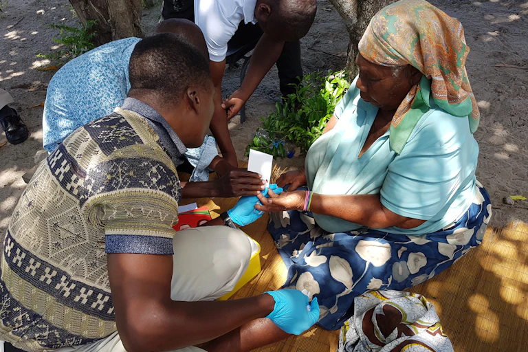 woman getting tested for malaria
