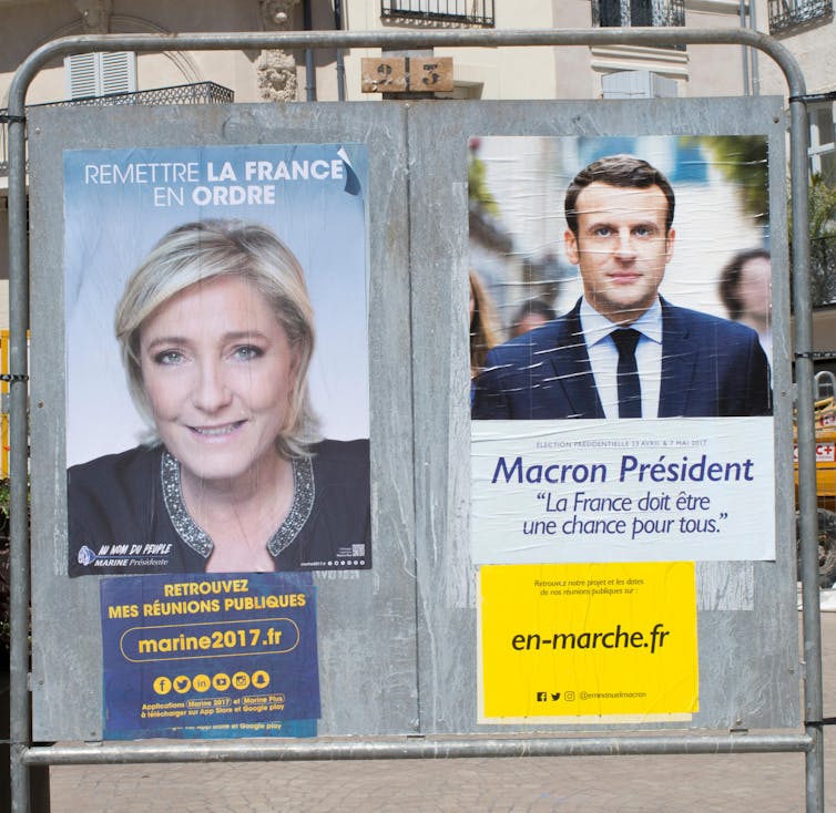 Elections posters for Marine Le Pen and Emmanuel Macron.