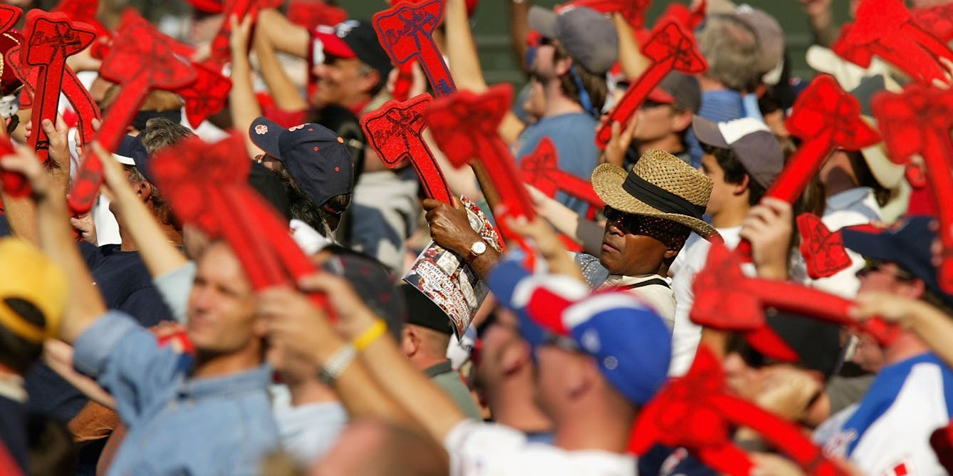 View of fans in stands holding Cleveland Indians muscled Chief Wahoo  News Photo - Getty Images