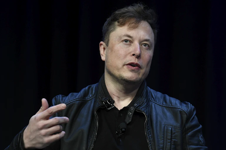 elon musk against a black background