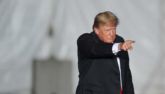 Donald Trump pointing and looking angry