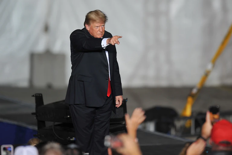 Donald Trump pointing and looking angry