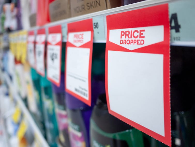 'Price drop' shelf tickets in a supermarket