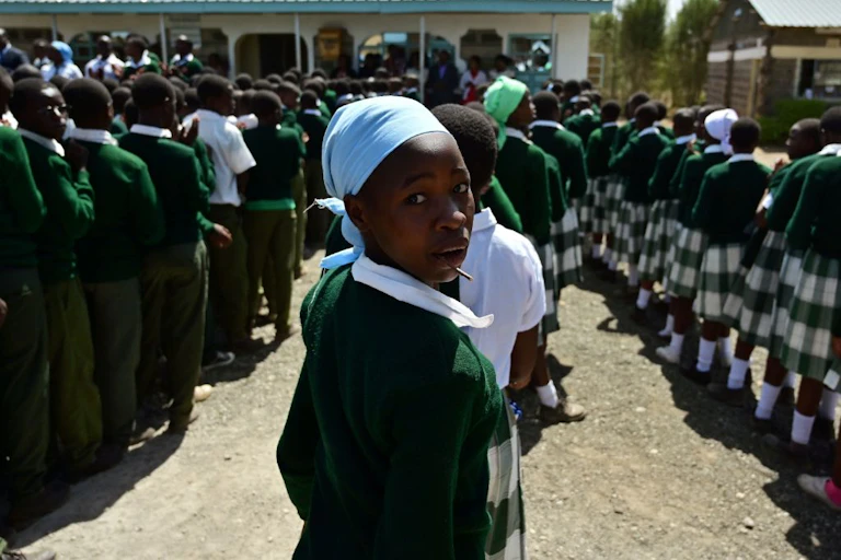 Children on a school assembly line