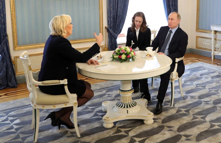 French presidential candidate and far-right Front National political party leader Marine Le Pen (L) speaks during a meeting with Russian president Vladimir Putin in the Kremlin in Moscow, March 2017.