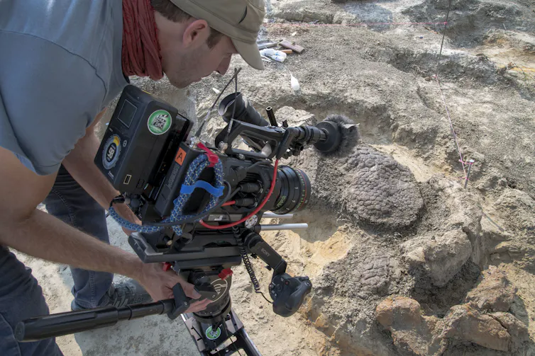 Ian Kellett on location in Tanis filming the Triceratops skin while it was still in the ground.