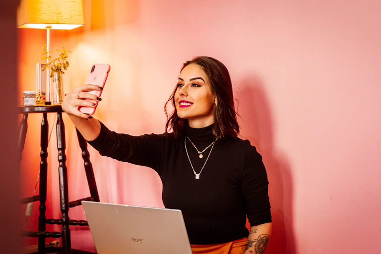 A pretty woman takes a selfie