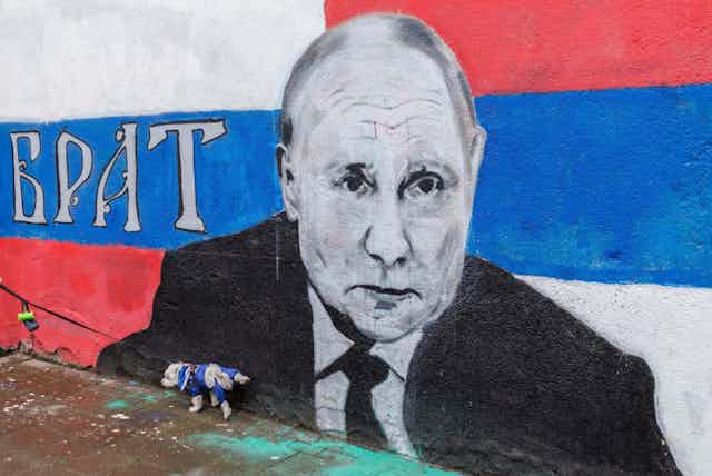 A graffiti of Russian President Vladimir Putin somewhere in Serbia, written on the wall is "brother”.