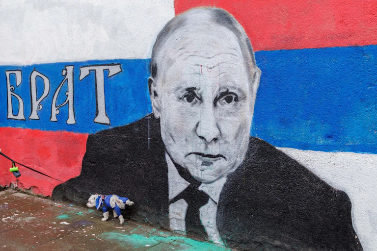 Grafiti bergambar Presiden Rusia Vladimir Putin.