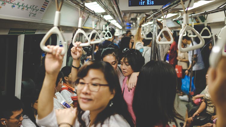 Women in a crowded train carriage