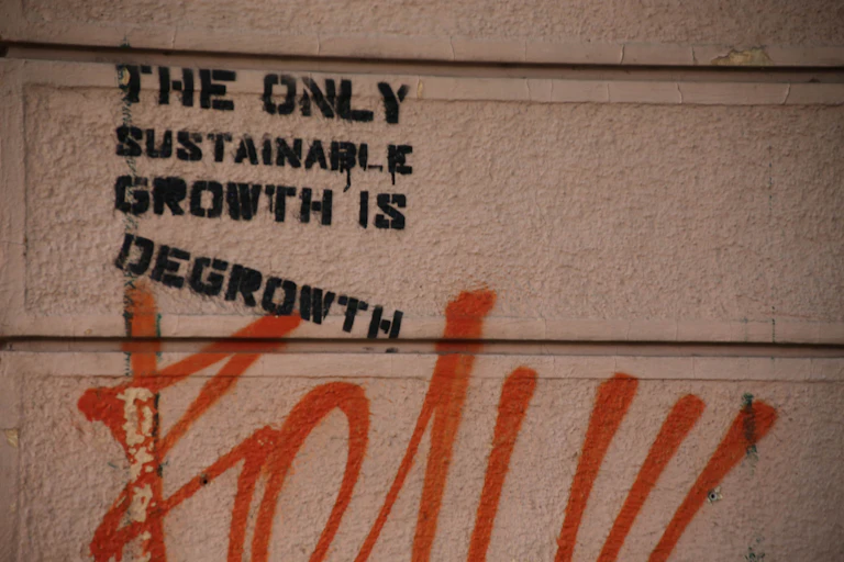 Graffiti reading The only sustainable growth is degrowth