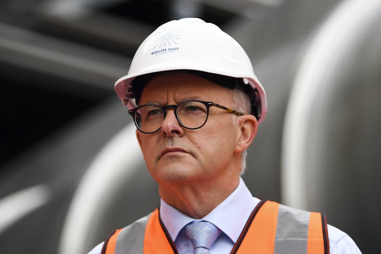 man in hard hat and glasses