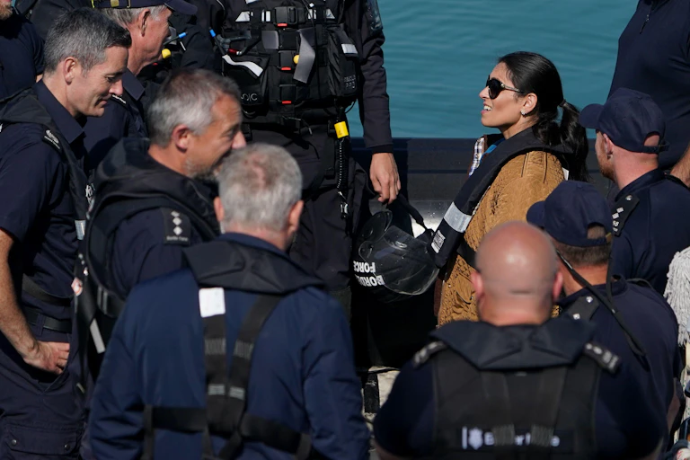 Priti Patel talks to border force officers in Kent.