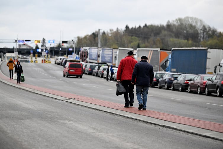 Ukrainian refugees attempting to cross the Poland-Ukraine border