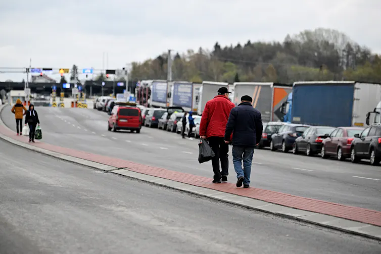 Ukrainian refugees attempting to cross the Poland-Ukraine border