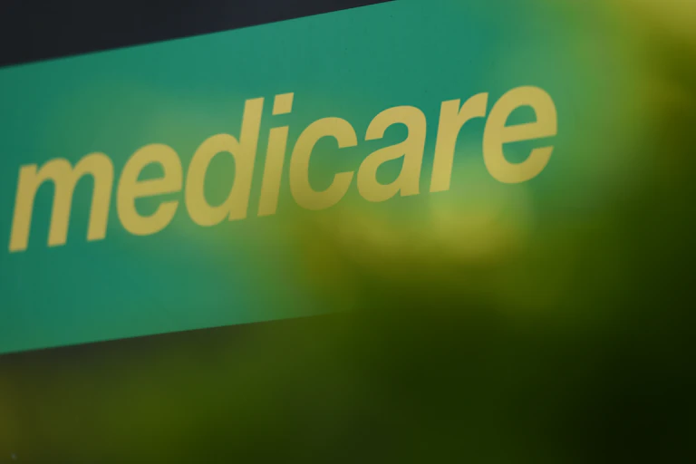 Green Medicare sign