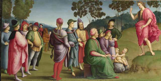 A painting by Raphael called St John the Baptist Preaching.