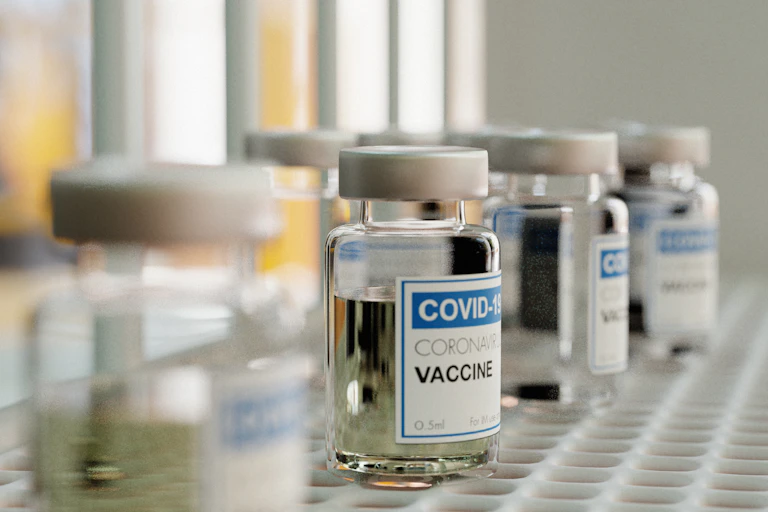 Small glass vials sitting in a lab.