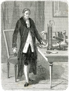 line drawing of 19th century man next to scientific apparatus