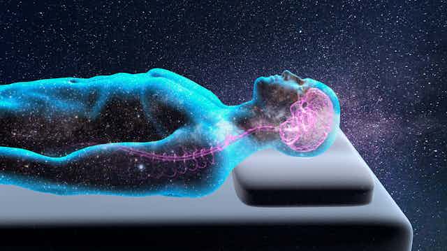 Artist's image of a man sleeping, his brain lit up.