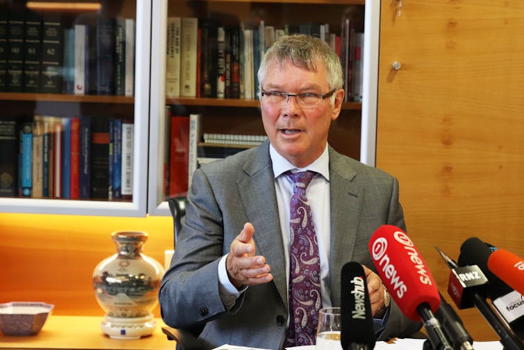 David Parker sitting in front of microphones