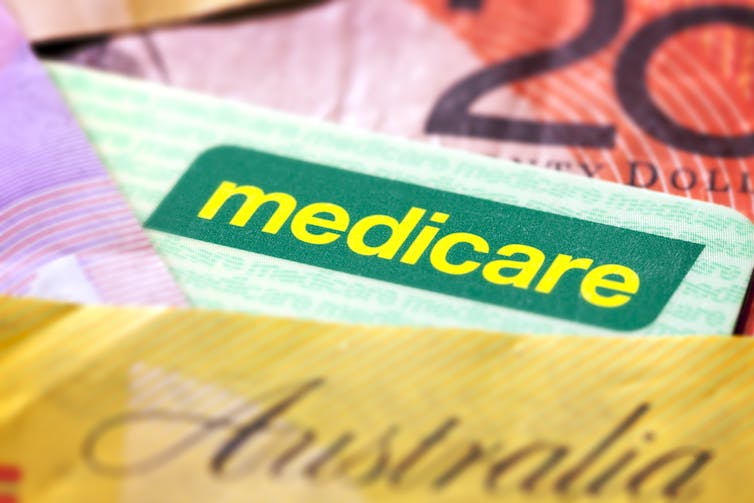 Medicare card and Australian bank notes