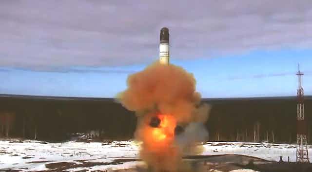 An RS-28 Sarmat intercontinental ballistic missile blasts off during a test launch from the Plesetsk Cosmodrome.