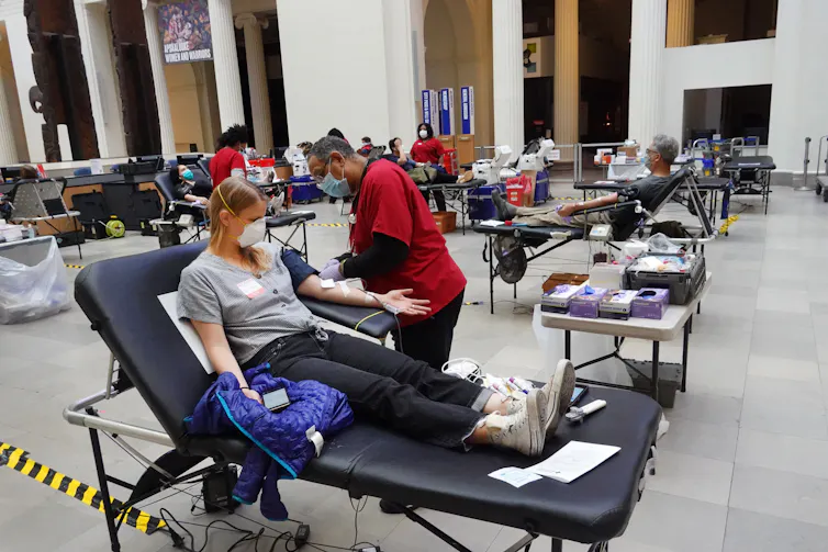 people donating blood at a blood drive