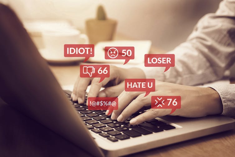 In this illustration, a laptop user is shown typing different sorts of mean-spirited comments.