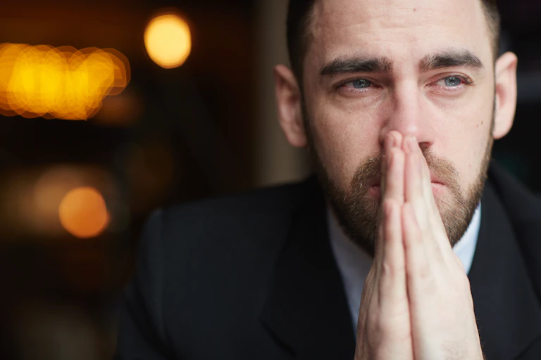 Man tired and teary